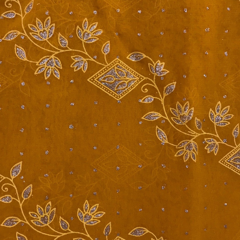 Stunning mustard colored sari. No blouse.